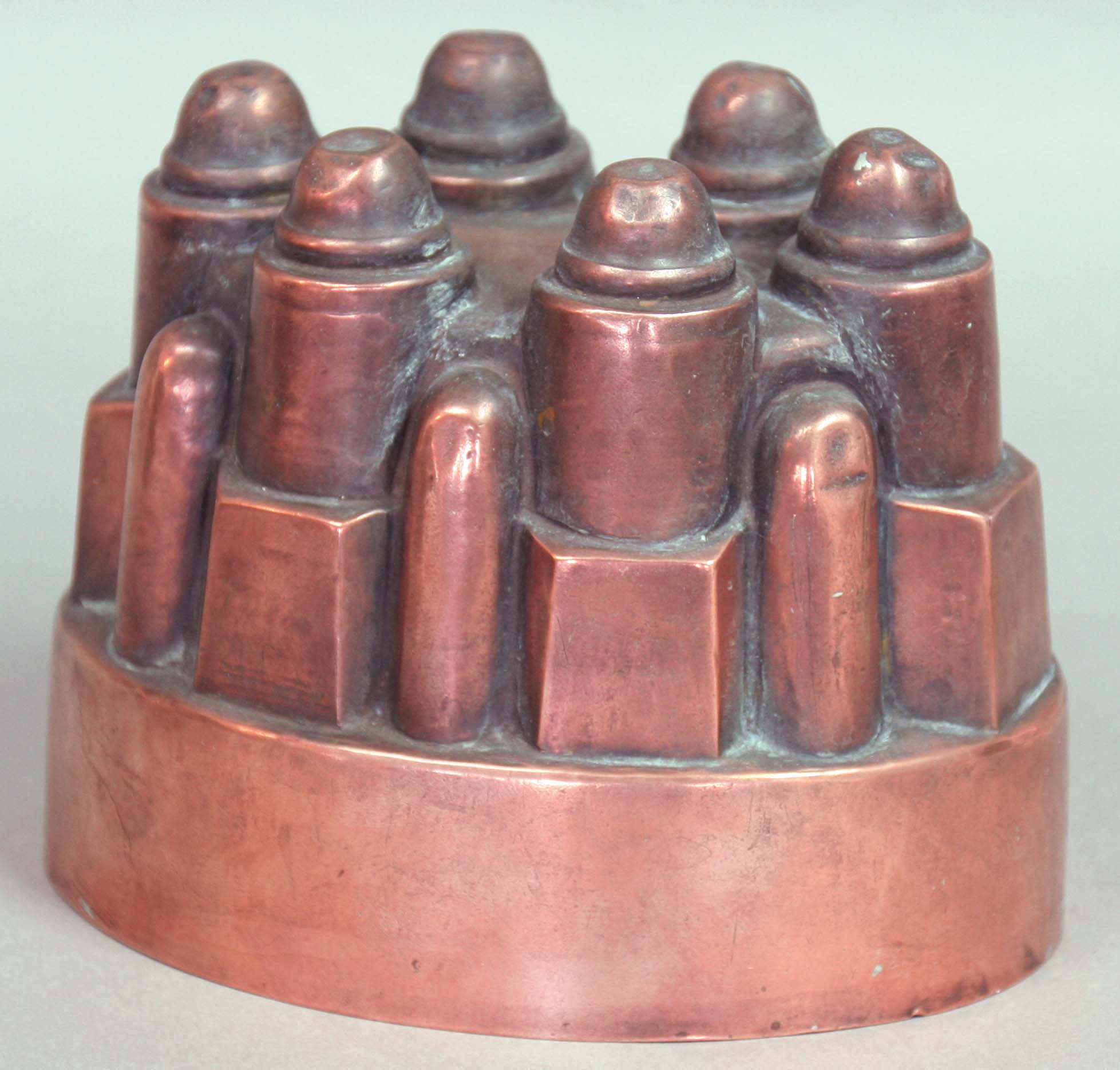 COPPER JELLY MOULD, late 19th century, stamped 643 beneath a cross and orb, length 13.5cm