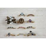 ELEVEN ASSORTED GOLD AND GEM SET RINGS