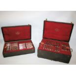 CHRISTOFLE & CIE - CANTEENS OF CUTLERY two leather cases containing a large qty of matching