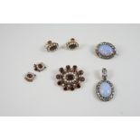 A QUANTITY OF JEWELLERY including a Georgian garnet and half pearl mourning brooch, 4cm. wide, a