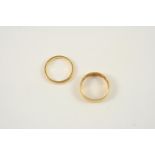 A 22CT. GOLD WEDDING BAND Size M 1/2, 4.2 grams, together with another 22ct. gold wedding band, size