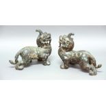 PAIR OF CHINESE TEMPLE DRAGONS, 20th century, modelled with a horn on their head, mouths open and