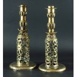 PAIR OF BRASS CANDLESTICKS, probably 19th century, with foliate pierced decoration, 29cm (2)