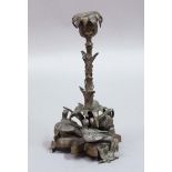 VICTORIAN BRONZE CANDLESTICK, modelled as three geese around a foliate sconce, height 22cm