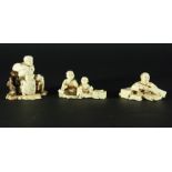 TWO JAPANESE IVORY OKIMONO, Meiji, including a man with a saw and two men with chisels (2)