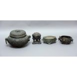 CHINESE BRONZE CENSER, of two handled form, with pierced cover, the body cast with a profusion of