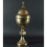 QAJAR BRASS CENSER, Persian, 19th century, of ogee form, with pierced figural and foliate