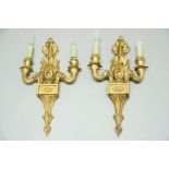 PAIR OF FLORENTINE GILTWOOD TWO LIGHT APPLIQUES, the pair of scrolling lights flanking a fruiting