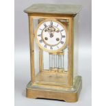GILT BRASS FOUR PANE MANTEL CLOCK, the 4 1/4" two piece enamelled dial inscribed J W Benson, Ludgate