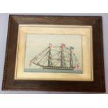 SAILOR'S WOOLWORK PICTURE, early 19th century, of a three masted ship at anchor flying various