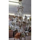 FIFTEEN LIGHT CHANDELIER the two tiers of lights on a gilt metal scrolling frame