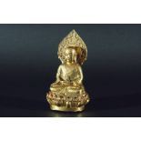 CHINESE BRASS BUDDHA, 18th century Qing dynasty style marks, seated in the lotus position, a