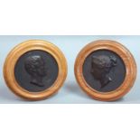 PAIR OF BOIS DURCI COMMEMORATIVE PLAQUES, with profile bust portraits of Prince Albert and