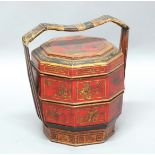 CHINESE TWO TIER BASKET AND COVER, of octagonal form, black, red and gilt painted with figural and