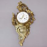 FRENCH BRASS CARTEL CLOCK, 19th century, the 4 3/4" enamelled dial on a brass eight day movement
