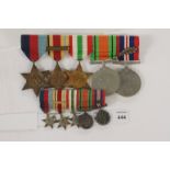 AN RAF OFFICERS GROUP OF FIVE MEDALS & MID EMBLEM. The mounted for wear group consists of, a 1939/