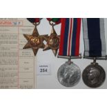 A PACIFIC STAR-LSGC R NAVY POW GROUP OF FOUR MEDALS. A 1939/45 & Pacific Stars, War Medal and Long
