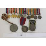 A TERRITORIAL EFFICIENCY MEDAL etc. A George V1 T E Medal named to 4389365 Cpl A Lawson R. North.