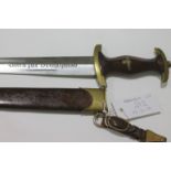 AN S A DAGGER. A German SA Dagger complete with scabbard and belt clip, Wf on the crossguard.