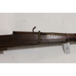 A RAMPART GUN. A 19thC style matchlock action Indian Rampart gun of heavy construction, complete