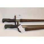 TWO FRENCH BAYONETS. Two 1874 pattern French Bayonets ans scabbards, both dated St Ettiene 1879.