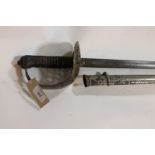 AN 1897 PATTERN SWORD. An officers 1897 pattern sword, with 32.1/4" single-edged blade marked Robt