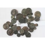 BASE ROMAN COINAGE. (42) Base metal Roman coins, mostly in worn or excavated condition. Including