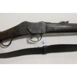 A MARTINI-HENRI CARBINE & A BAYONET. A Matini-Henri carbine with Crown over a faint VR then Enfield,