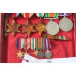 WW11 MEDAL GROUP & MINIATURES. A WW11 group of five medals, unnamed as issued. Consisting of a