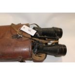 CASED TANK BINOCULARS. Leather case B H & G Mk 1V No 5 heated Tank Binoculars, dated 1944. In need