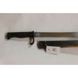 A GERMAN BAYONET. A Gt War 'Butcher' bayonet with steel scabbard, maker Alex Coppell of Solingen