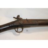 A SPORTING GUN. An old Sporting Gun converted from Flintlock to Percussion many years ago, by the