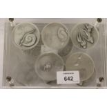 CASED SALVADOR DALI SILVER MEDALLIONS. (10) Acrylic cased Salvador Dali medallions with 1975 and