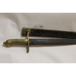 A CONTINENTAL SIDEARM. A 19thC continental sidearm with brass ribbed grip, complete with brass