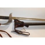 AN OFFICERS SWORD. A QE11 cypher 1897 pattern officers sword, complete with swordknot and