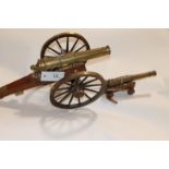 A SCALE FIELD CANNON. A scale model field cannon with 9.3/4" brass barrel, having an overall