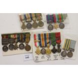 MINIATURE MEDAL GROUPS. An original five medal group mounted for wear, QSA bars CC-Belmont-OFS and