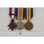 A SCOTS GUARDS 1914 STAR/BAR TRIO. A 1914 Star with bar also British War & Victory Medals named to