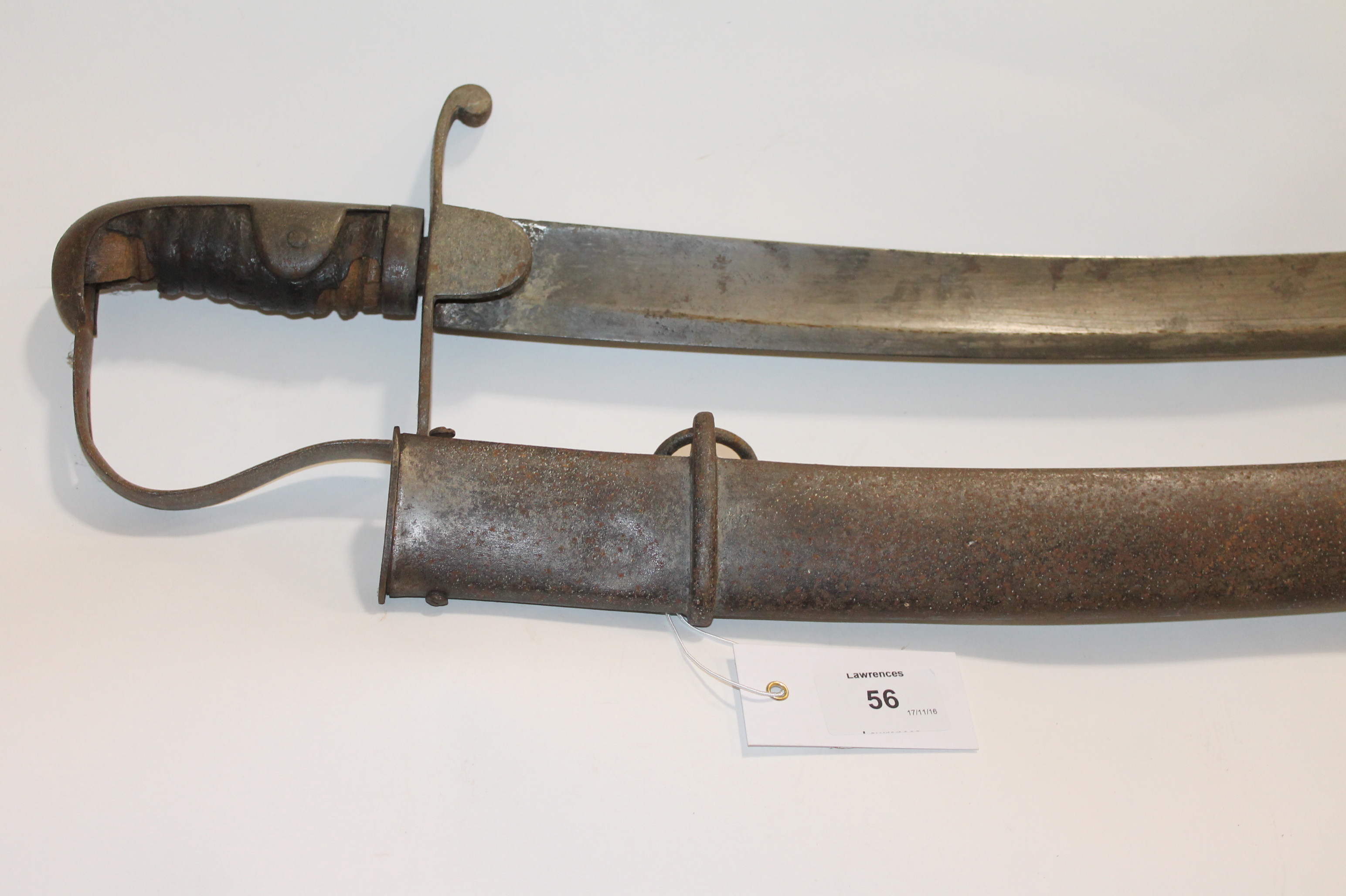 A 1796 LIGHT CAVALRY TROOPERS SWORD. The 32.3/4" single-edged curved blade lacks the final 1/4-3/