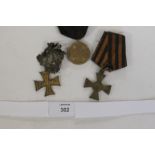 TWO GERMAN GT WAR MEDALS etc. A gilt round medal with the date 1870/1871 inside a cross. AQ cross