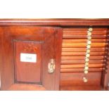 A COIN COLLECTORS CABINET. 12.1/2" x 9.1/4" by 9" with 12 slim drawers and one larger one, in