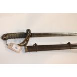 A VICTORIAN OFFICERS SWORD. A brass hilted officers sword with VR cypher inset, also VR under a