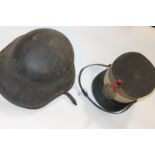 A GERMAN HELMET & SPANISH CAP. A steel German Helmet in the lightweight M1934 style, with webbing