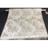 A ROLL OF VINTAGE CHINESE CREAM SILK DAMASK Unmarked heavy satin silk. 11.5 Metres x 55cms. And a
