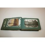 POSTCARD ALBUMS containing a variety of cards including, Military (silk cards, Leicester