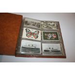 POSTCARD ALBUM with various cards including Ships (RMS Queen Elizabeth, US Lines America), GB