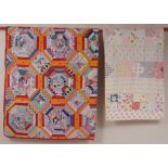 TWO 1930'S PATCHWORK QUILTS A wonderful colourful quilt with strips of cotton shirt fabrics from the