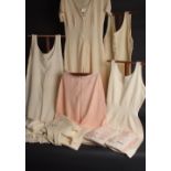 A COLLECTION OF 1940'S CC41 MEN'S UNWORN WOOL UNDERWEAR. Extremely soft wool vests, large pants, a