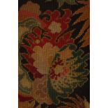 C20TH TAPESTRY CURTAINS Two curtains embroidered in tent stitch. Floral motifs in autumn colours