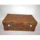 LARGE LEATHER SUITCASE the large case with patent lever locks, and a material lined interior. 70